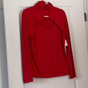 Red tight, fit sweater, turtleneck, peekaboo front